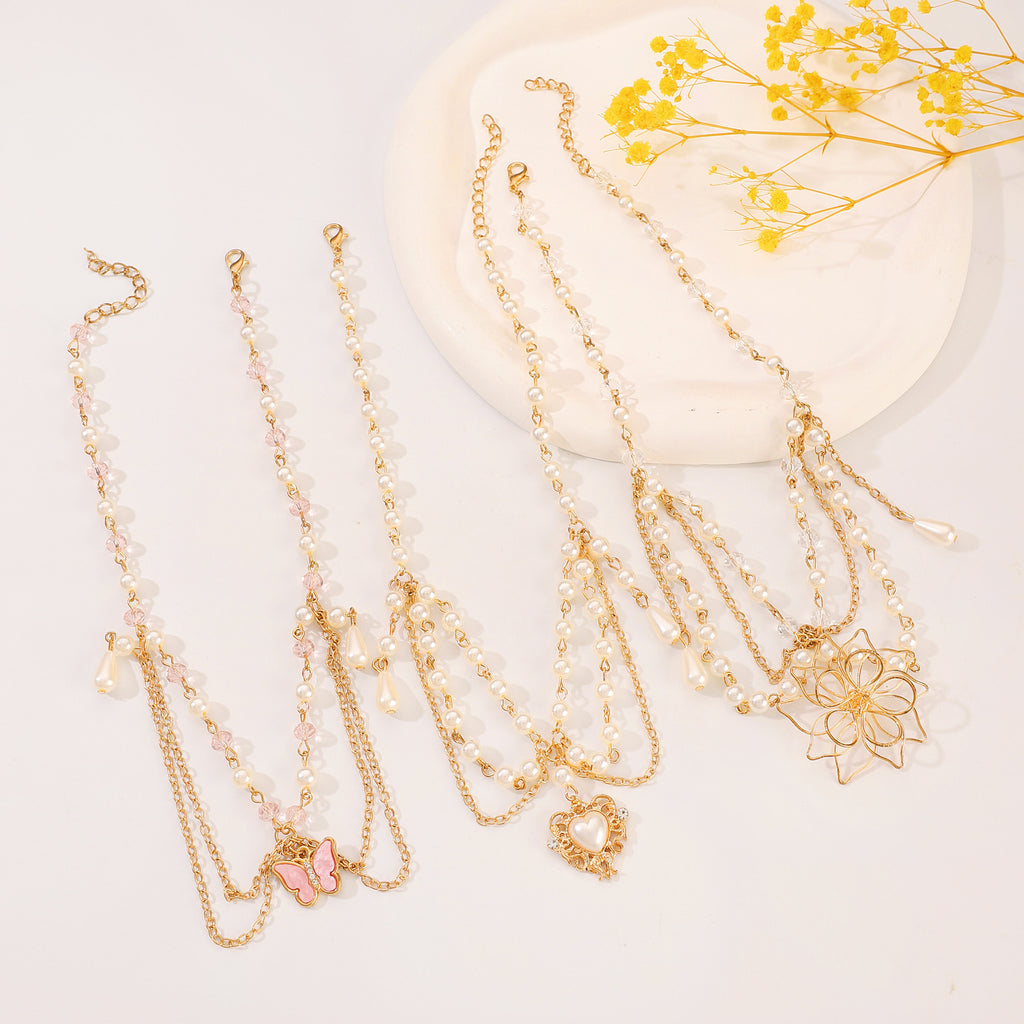 Celebrity Style Jewelry Niche Design Hot Girl Imitation Pearl Tassel Heart Cross Butterfly Versatile Necklace for Women